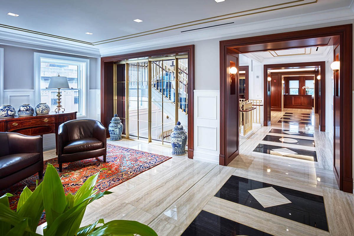 Luxurious hotel lobby with elegant decor and seating.