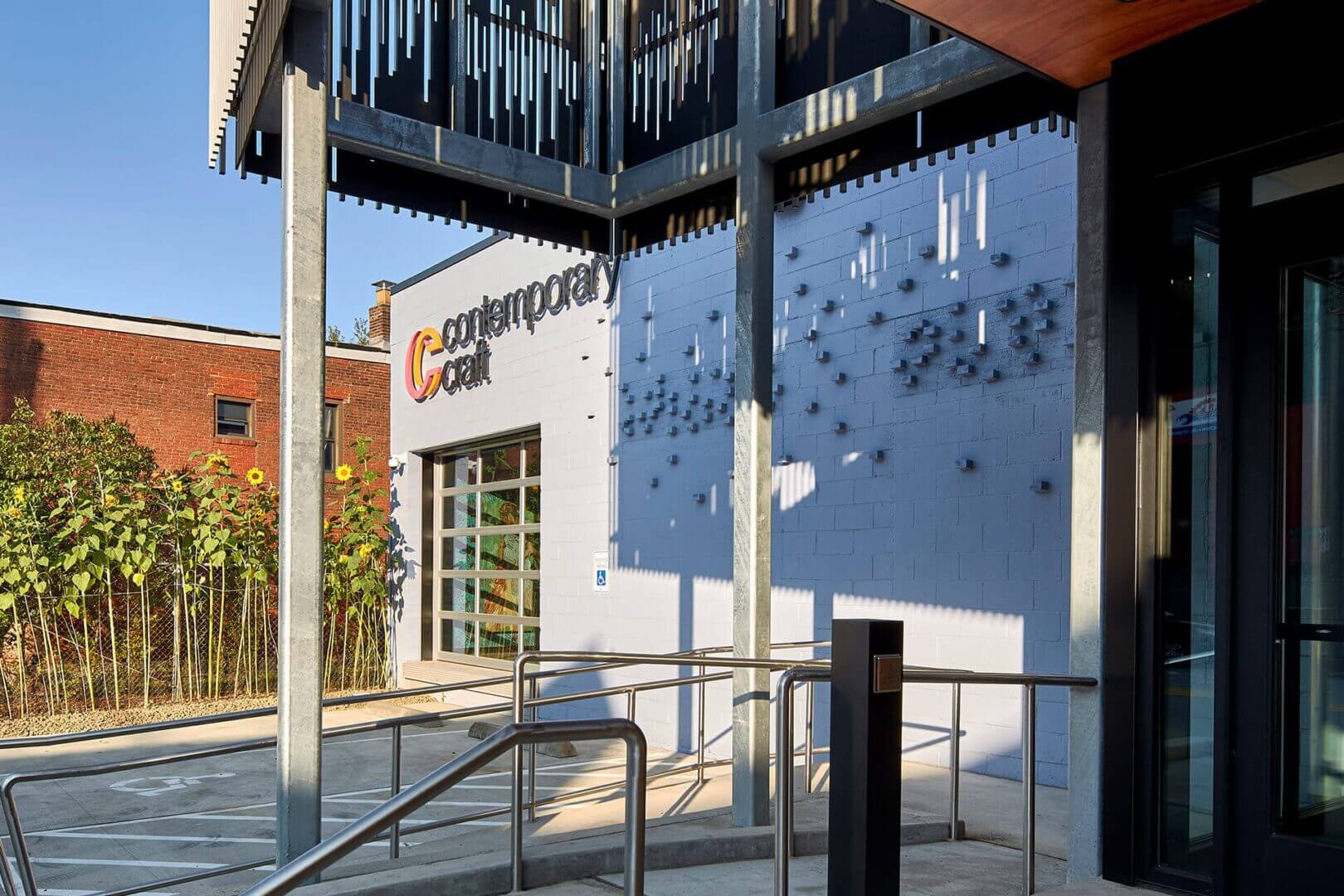 Exterior view of a building with a sign reading 'Culinary Concepts'.