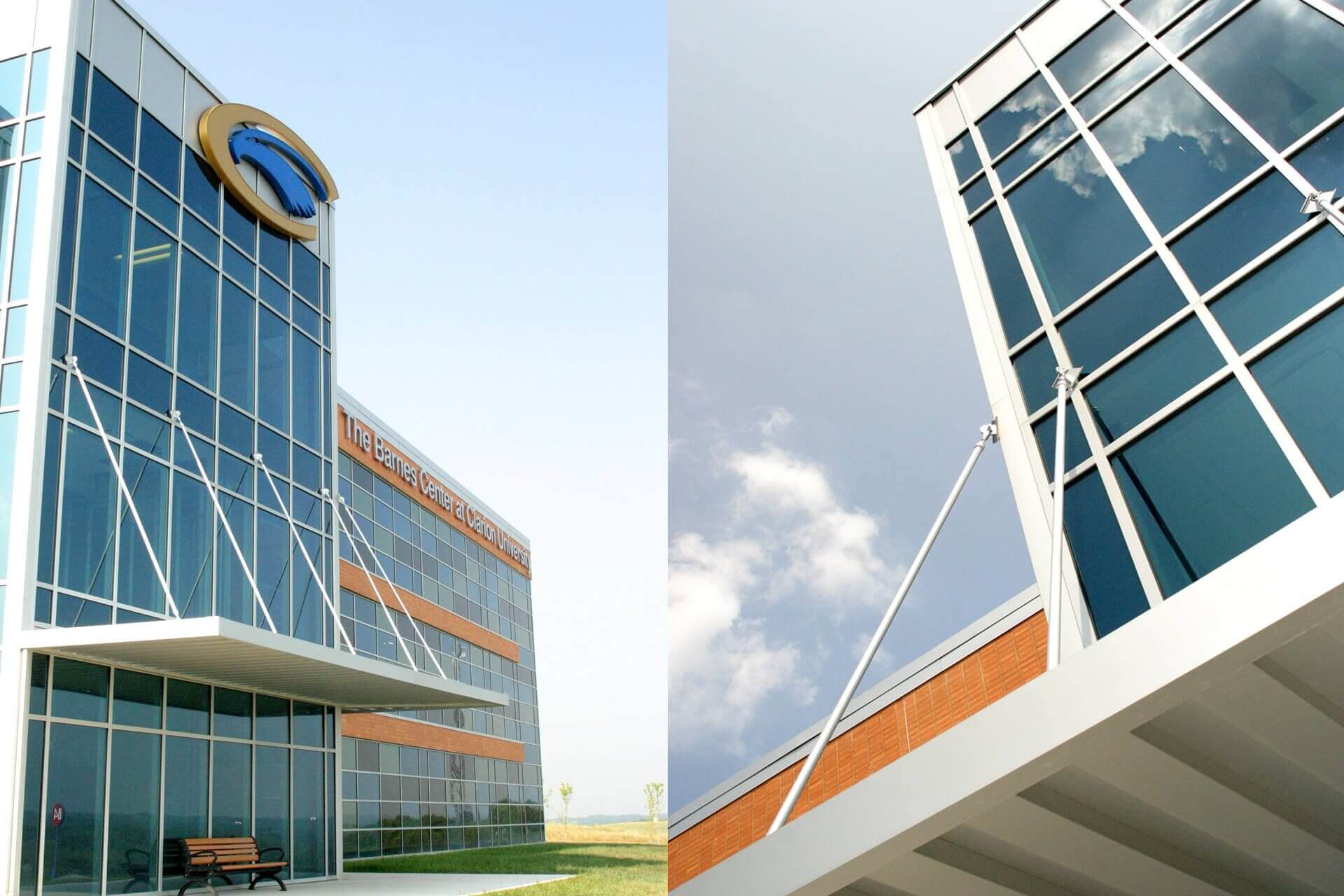 Modern corporate buildings with glass facades under a clear sky.