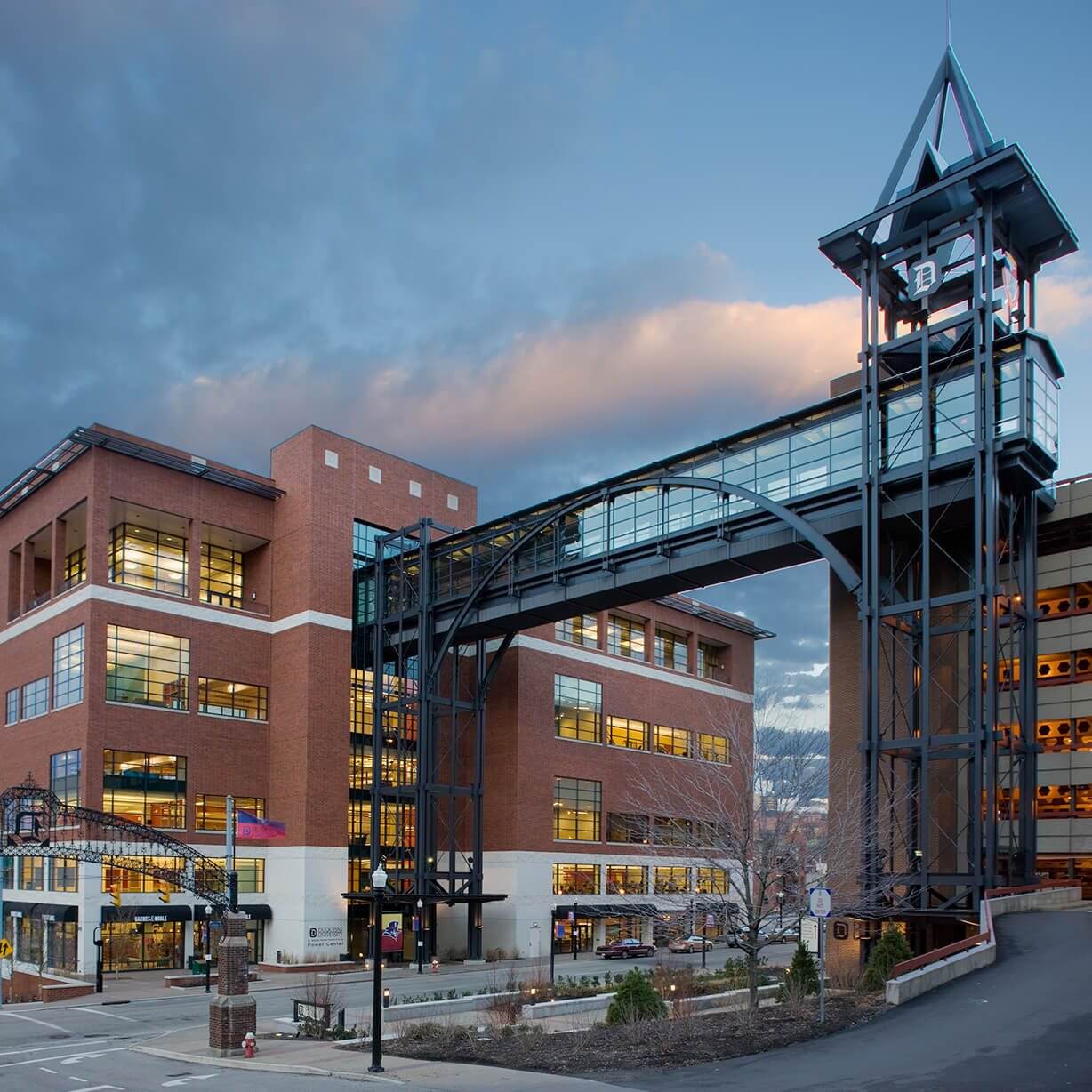 Brick office complex with elevated glass skybridge
