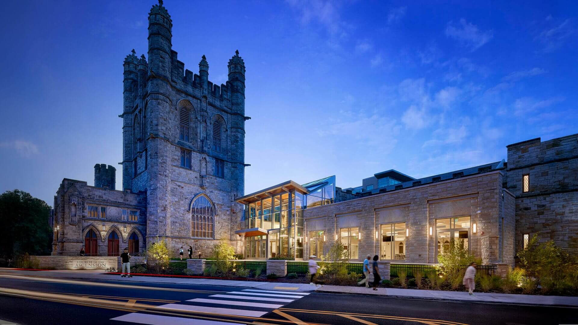 Historic stone church with modern glass addition